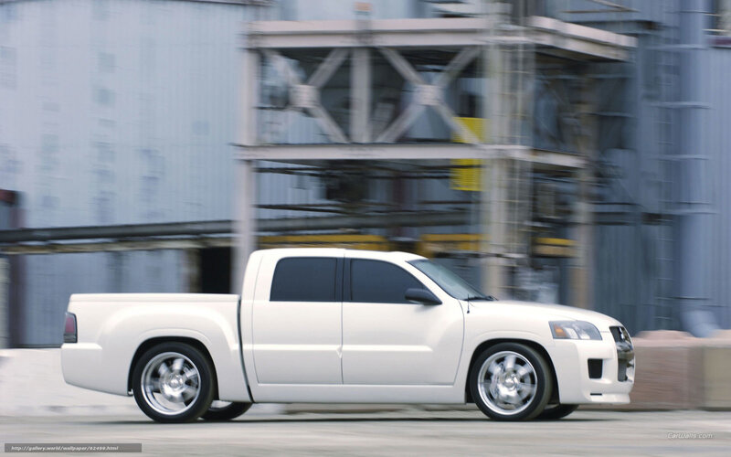 white pickup truck in motion