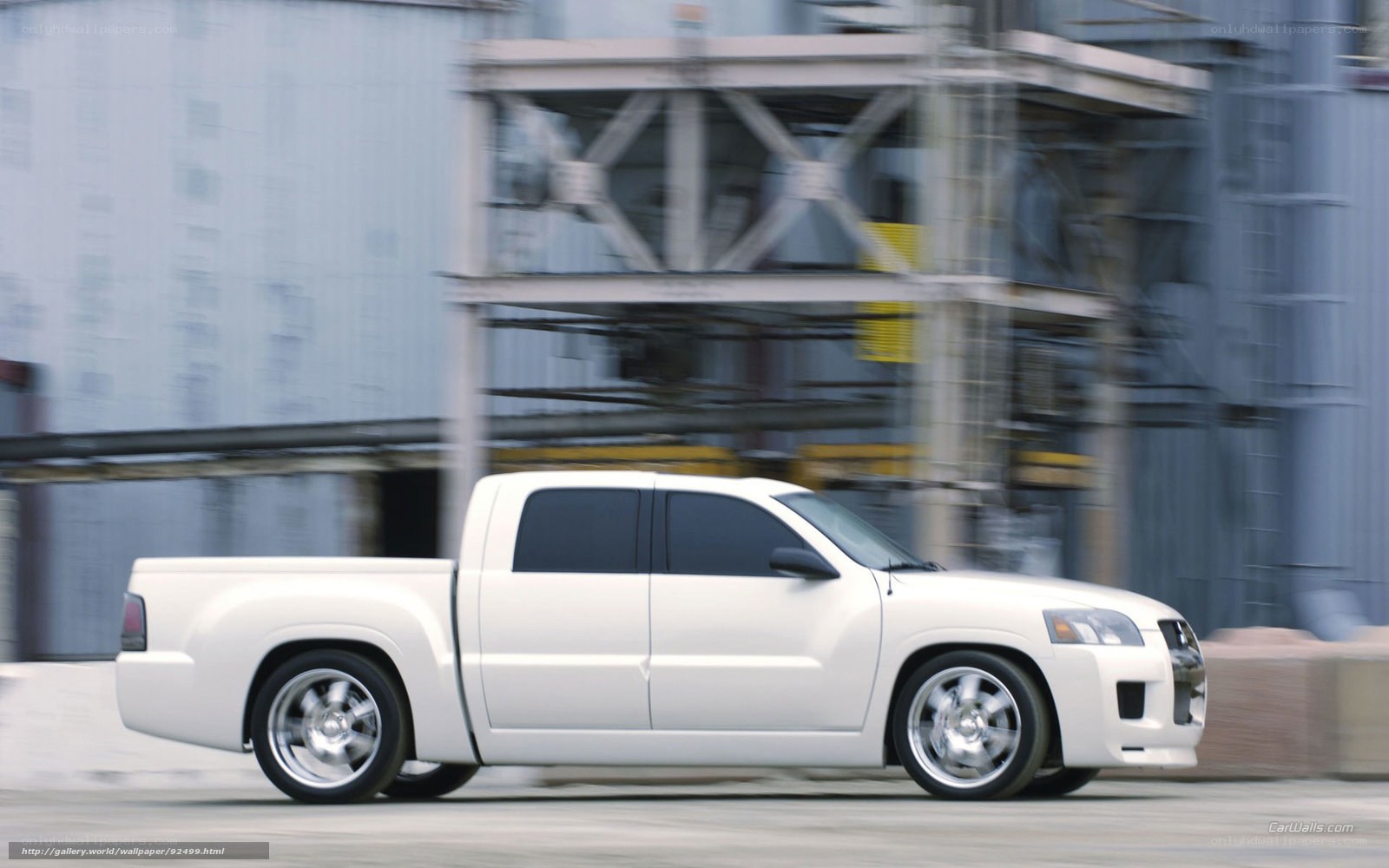 white pickup truck in motion