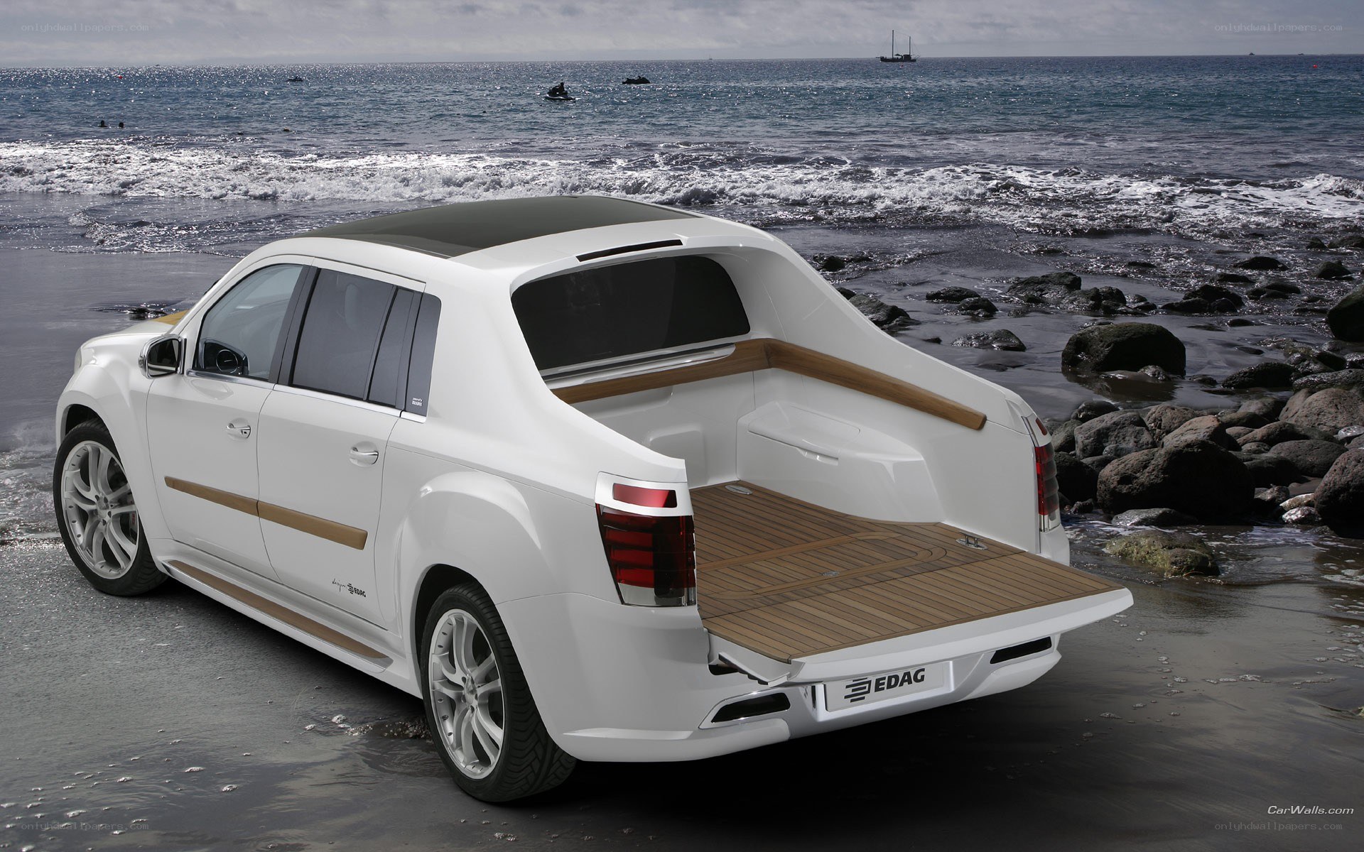 white pickup truck on beach