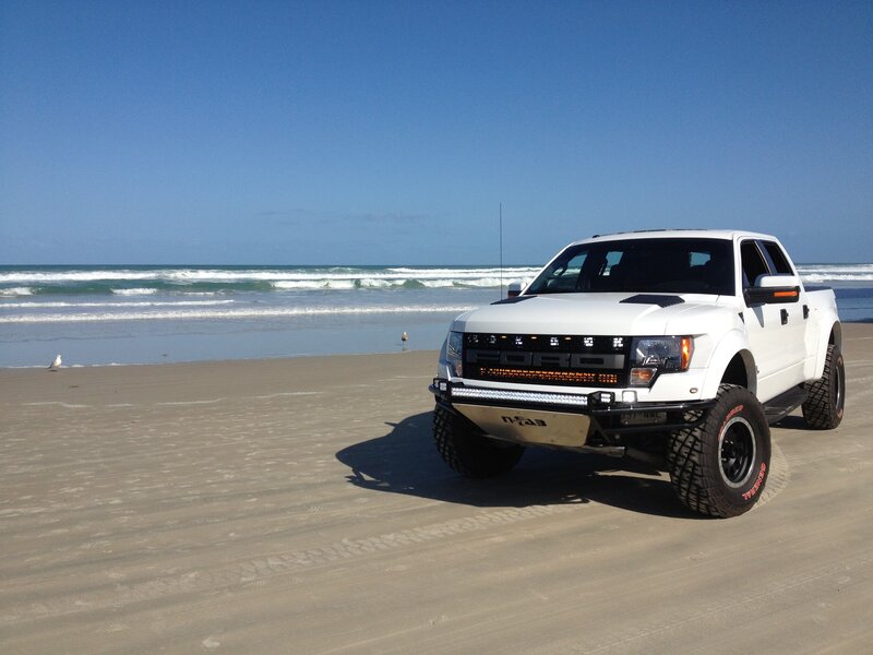 White Pickup Truck on Beach — Serene