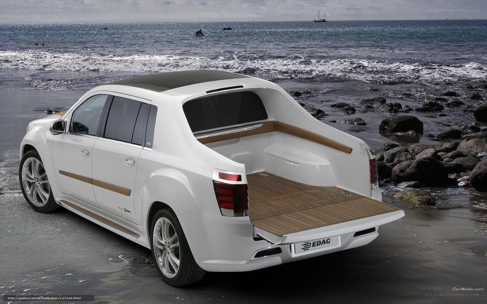 White pickup truck on beach