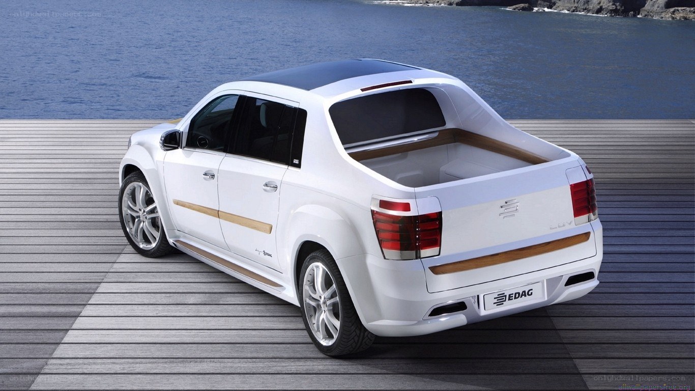 white pickup truck on dock