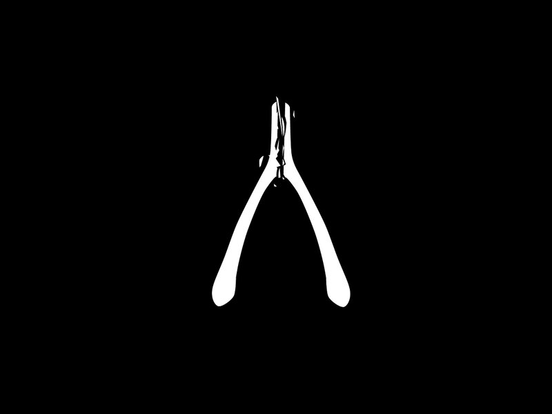 white pliers on black background