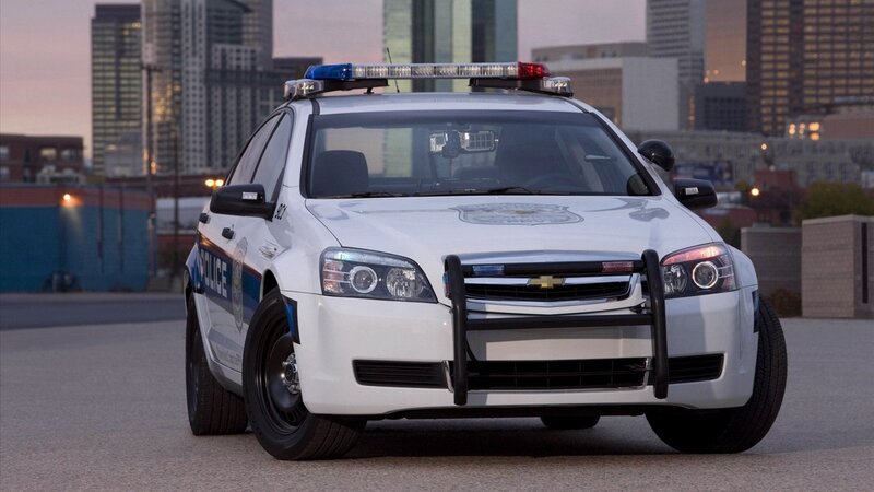 white police car in city