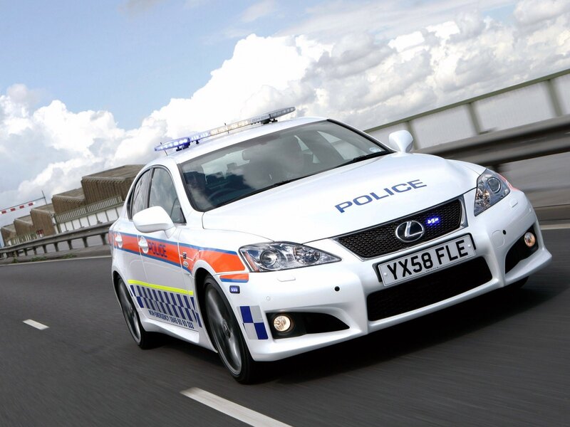 white police car in motion