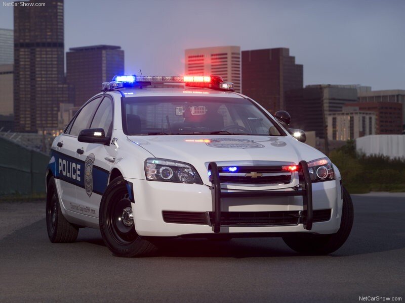 white police car with lights