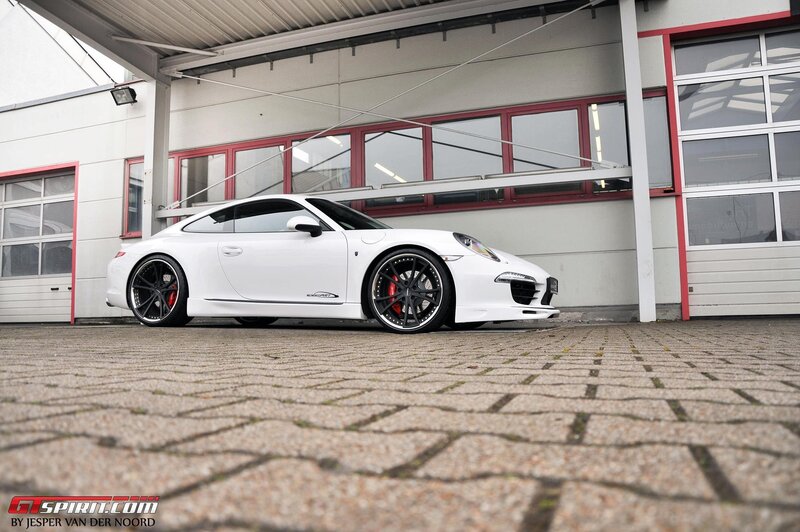 White Porsche 911 on cobblestones