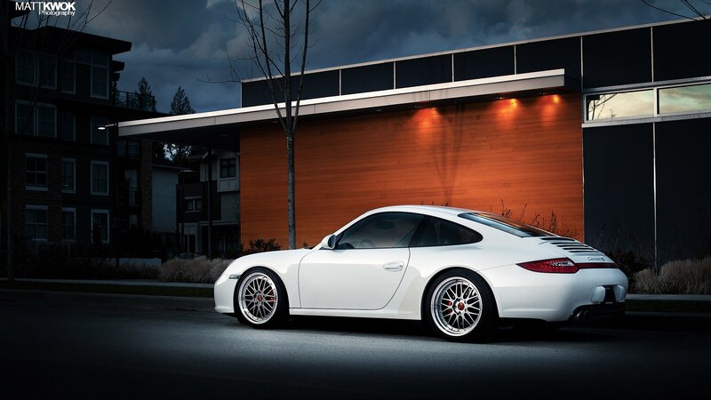 White Porsche 911 parked at night