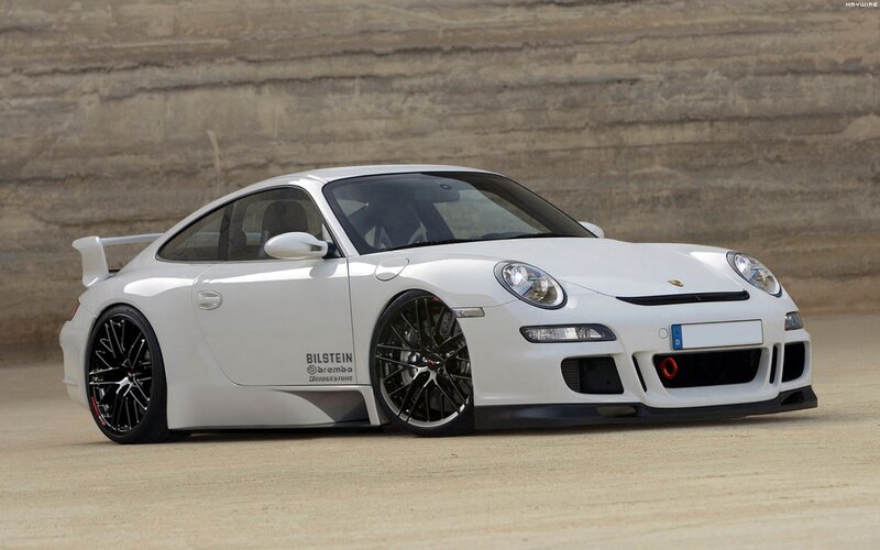 white porsche 911 with aftermarket parts