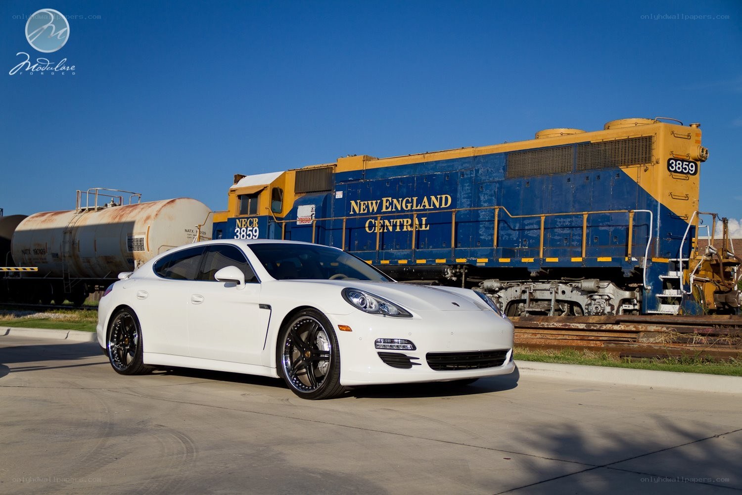 White Porsche and train