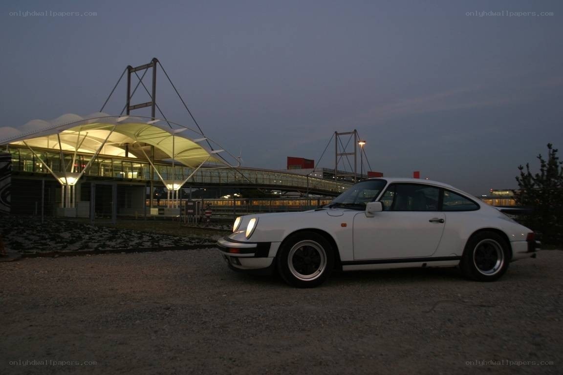 White Porsche at dusk