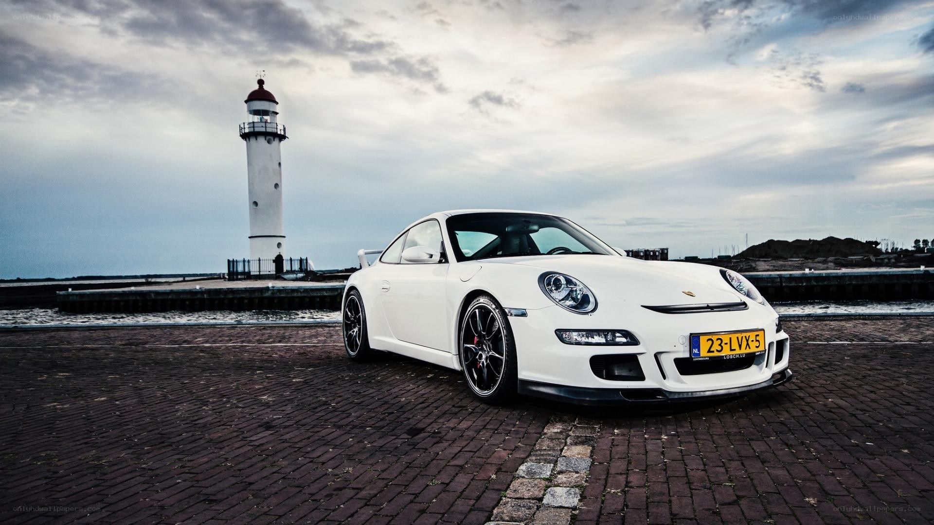 White Porsche at lighthouse