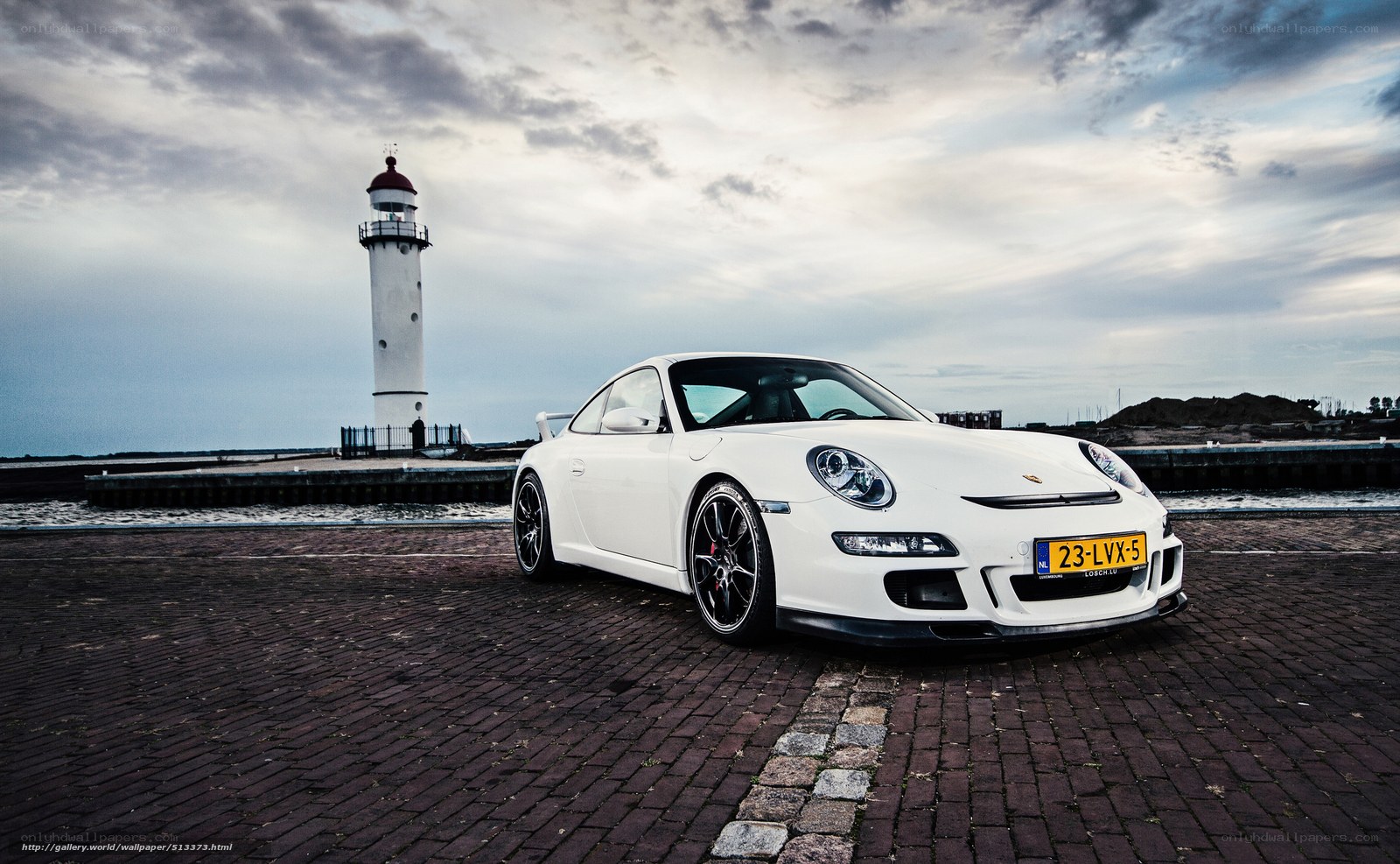 White Porsche at lighthouse
