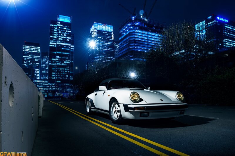 White Porsche at night in the city