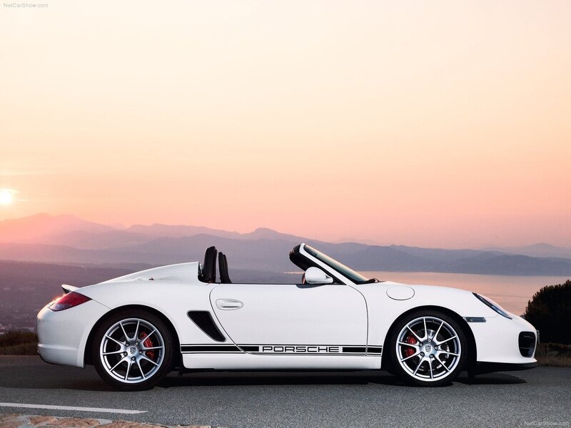 White Porsche Boxster at sunset