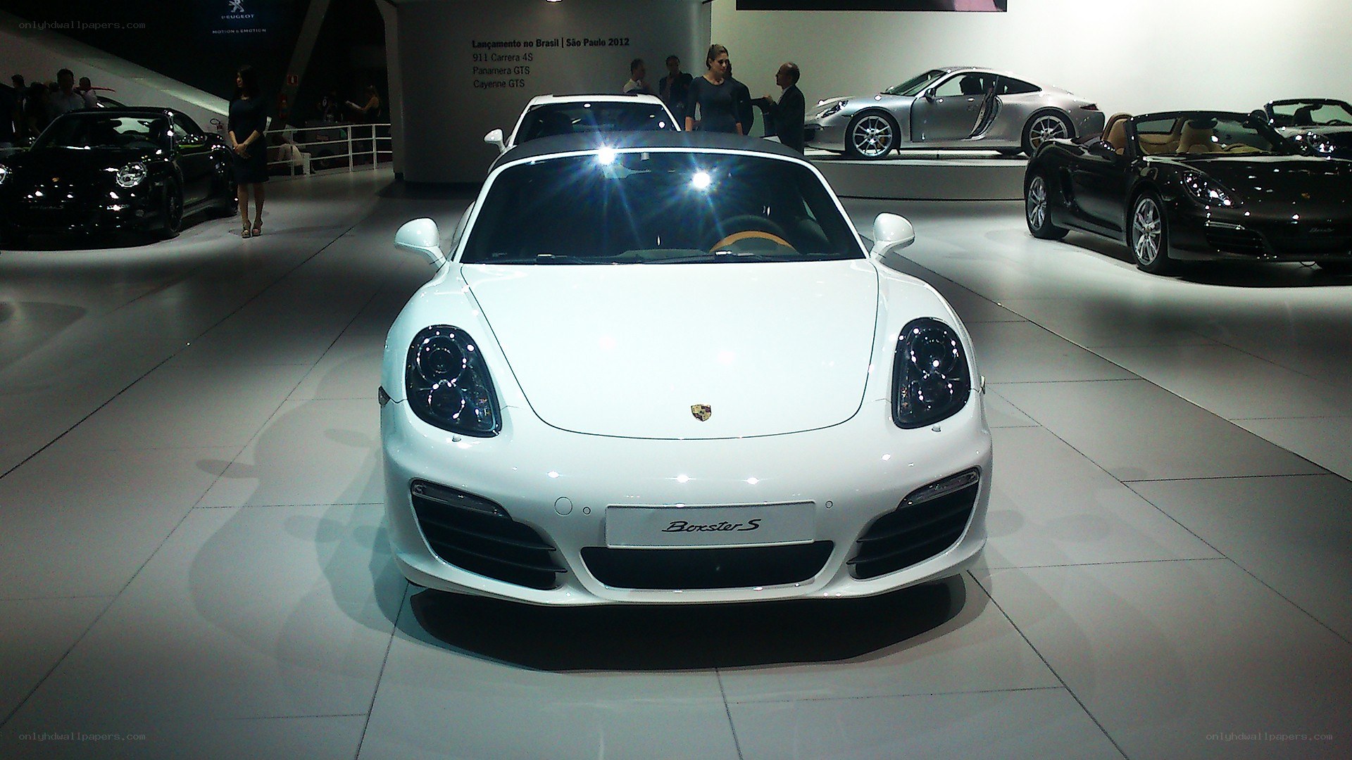 White Porsche Boxster S on display