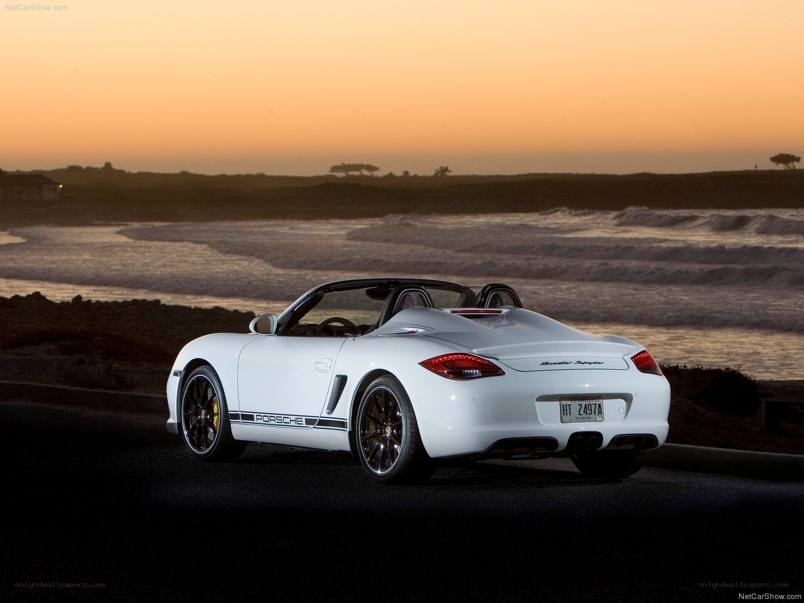 White Porsche Boxster Spyder at sunset