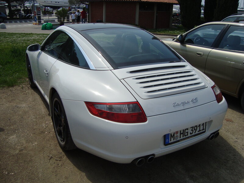 white porsche carrera 4s