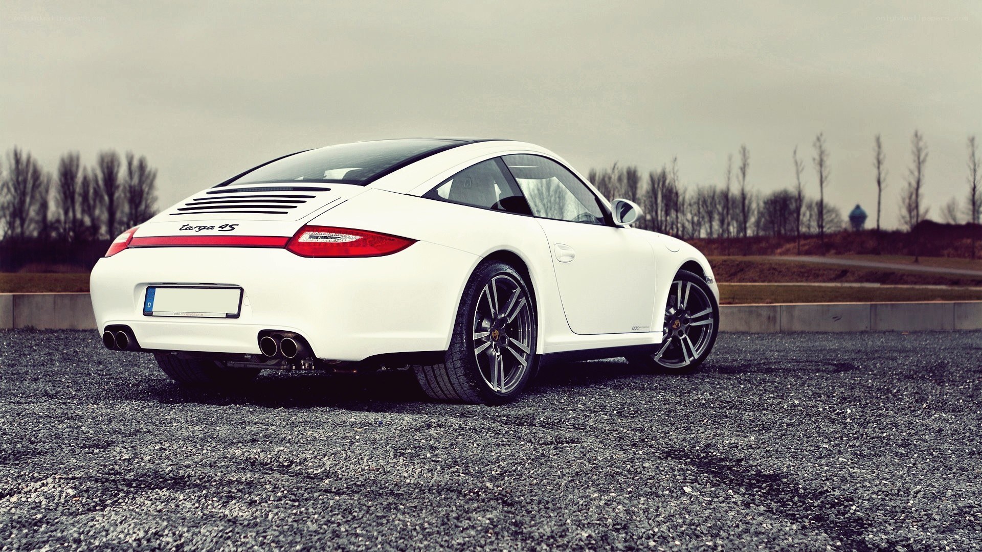 white porsche carrera 4s