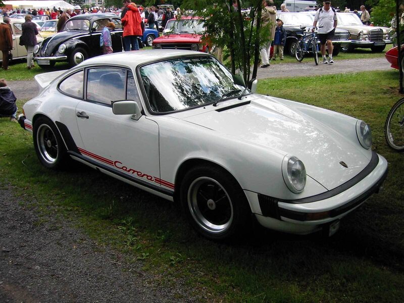 White Porsche Carrera at car show