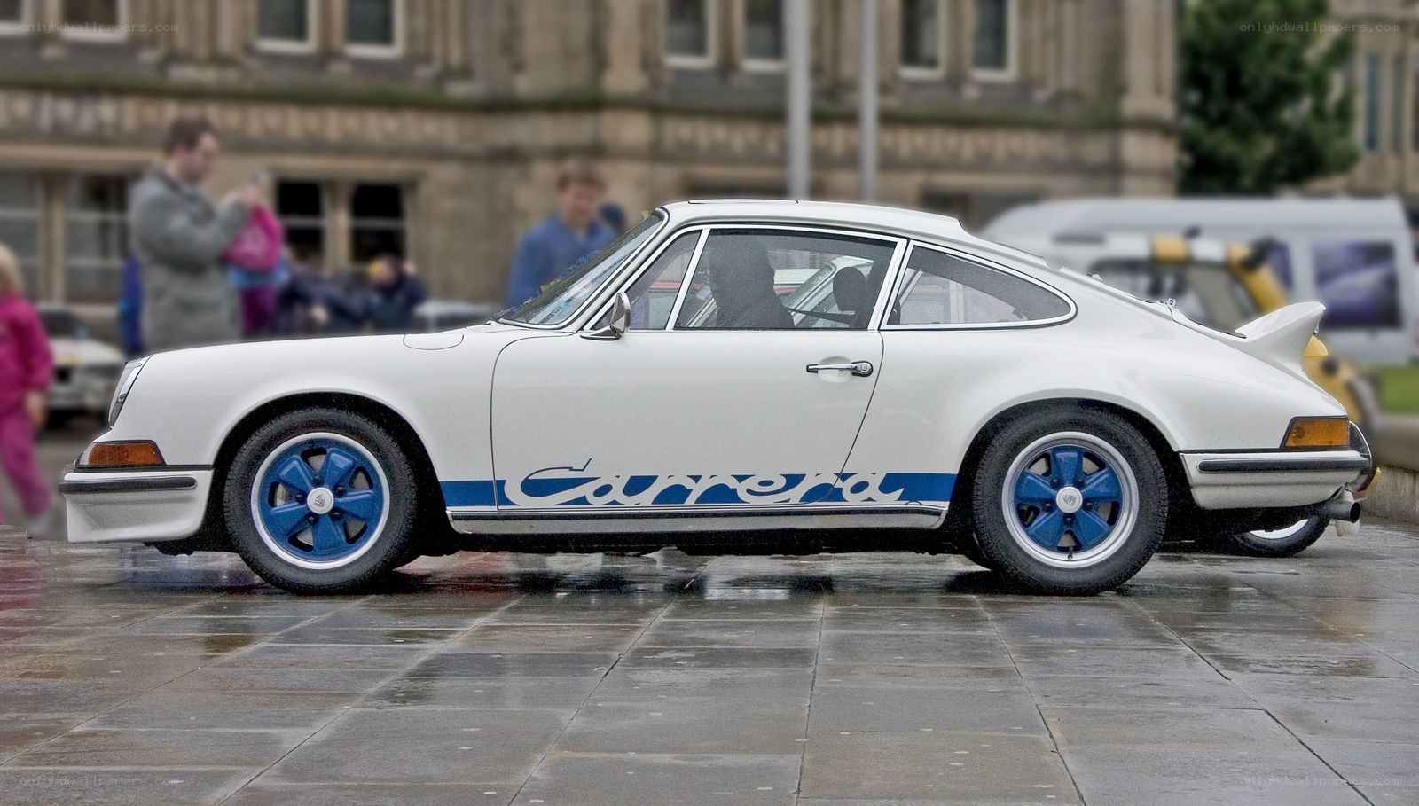 White Porsche Carrera on display