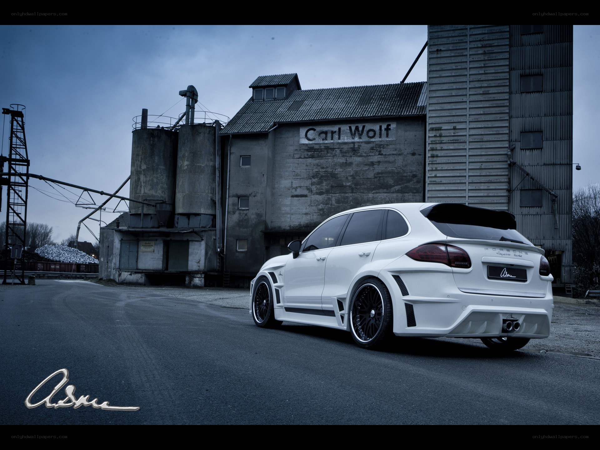 White Porsche Cayenne by Carl Wolf