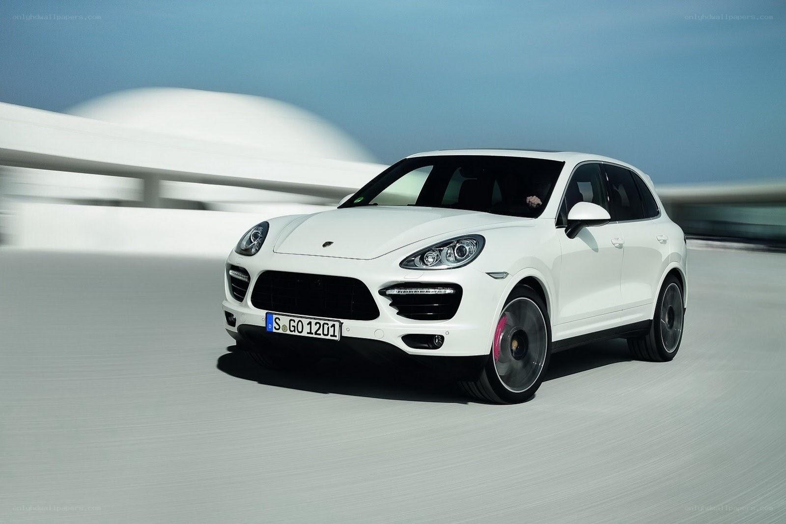 White Porsche Cayenne in motion