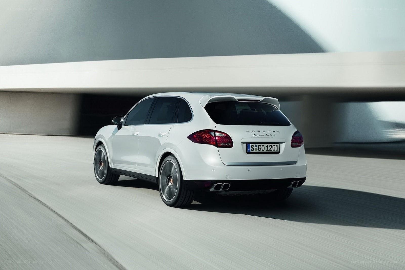 White Porsche Cayenne in motion