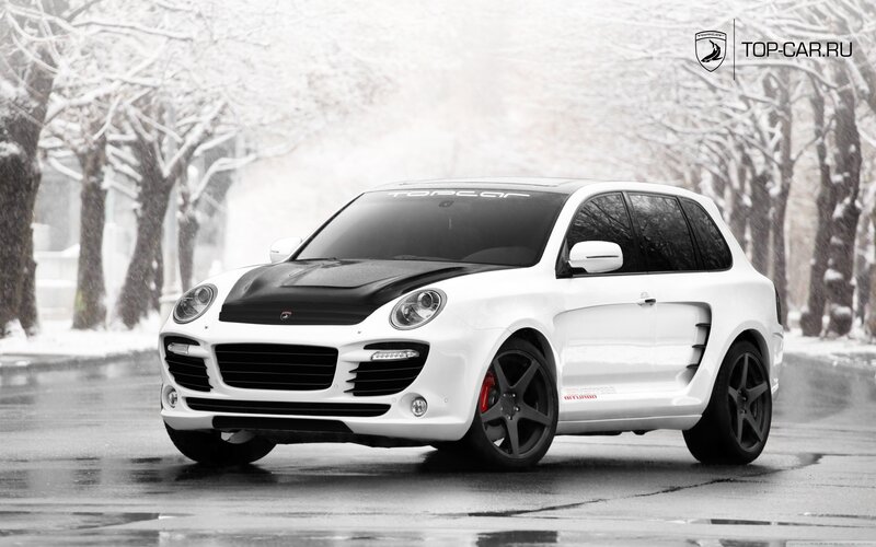 white porsche cayenne in snow