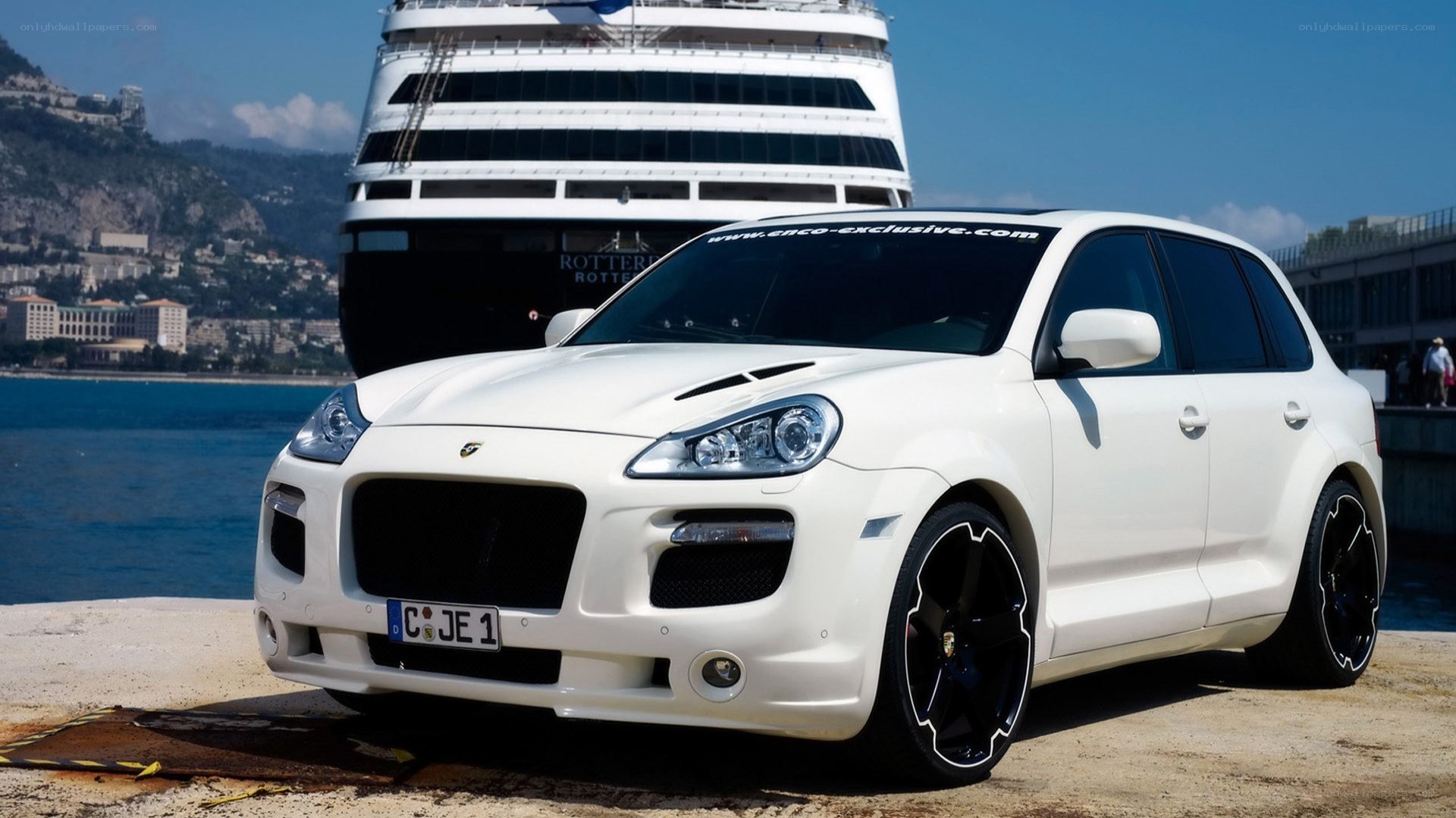 White Porsche Cayenne on a dock