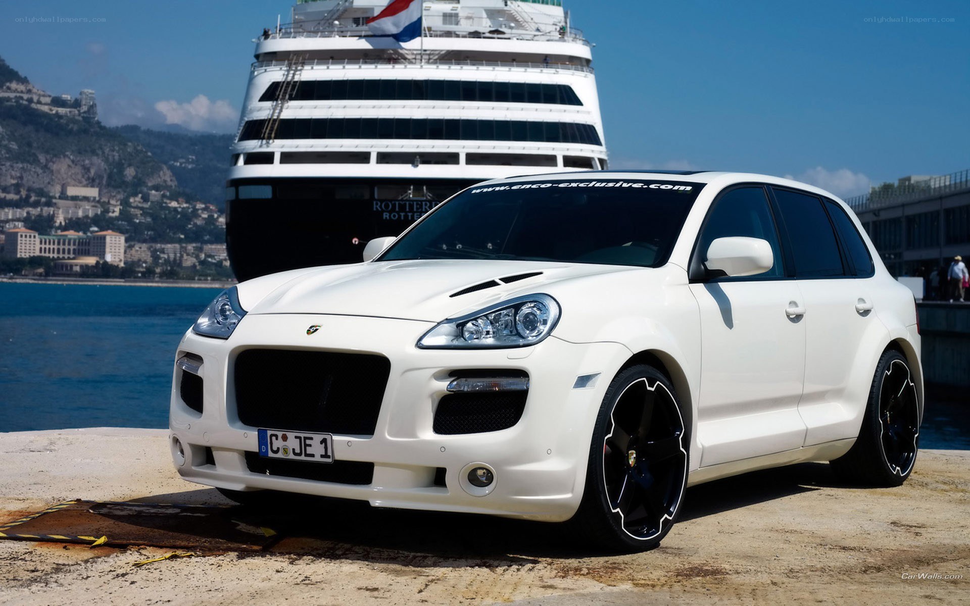 White Porsche Cayenne on dock