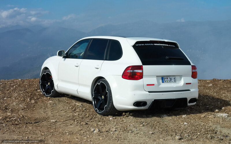 white porsche cayenne on mountain