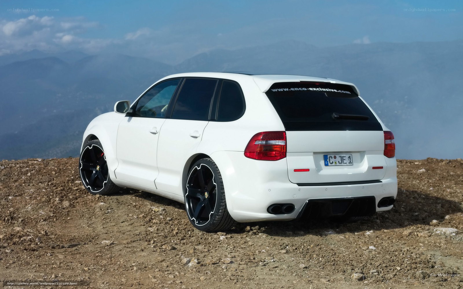 white porsche cayenne on mountain