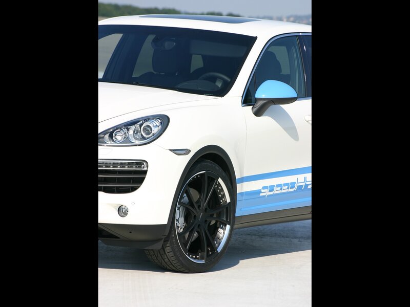 white porsche cayenne with blue accents