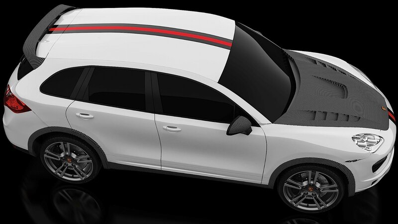 white porsche cayenne with carbon fiber