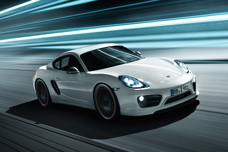 White Porsche Cayman in motion
