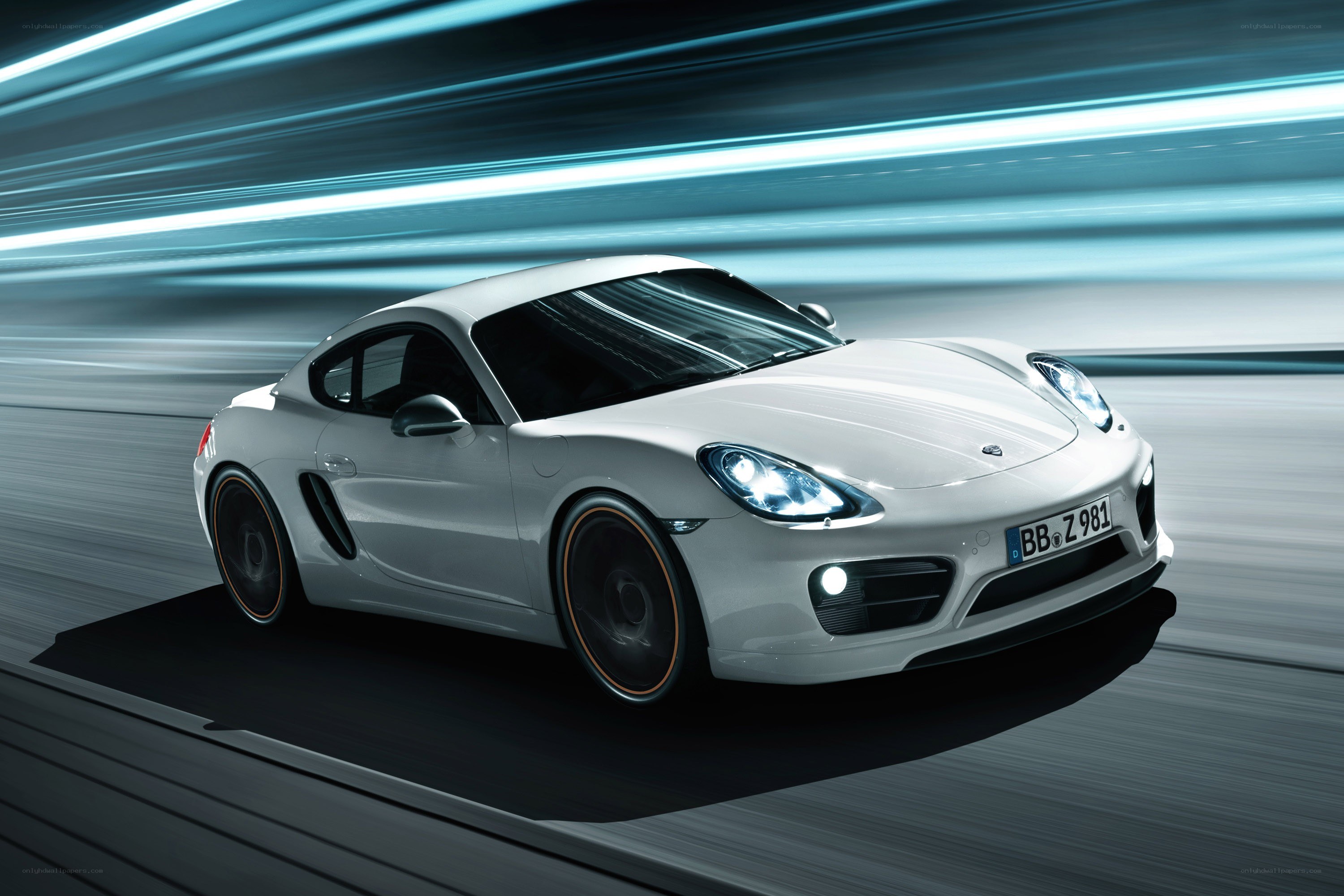 White Porsche Cayman in motion