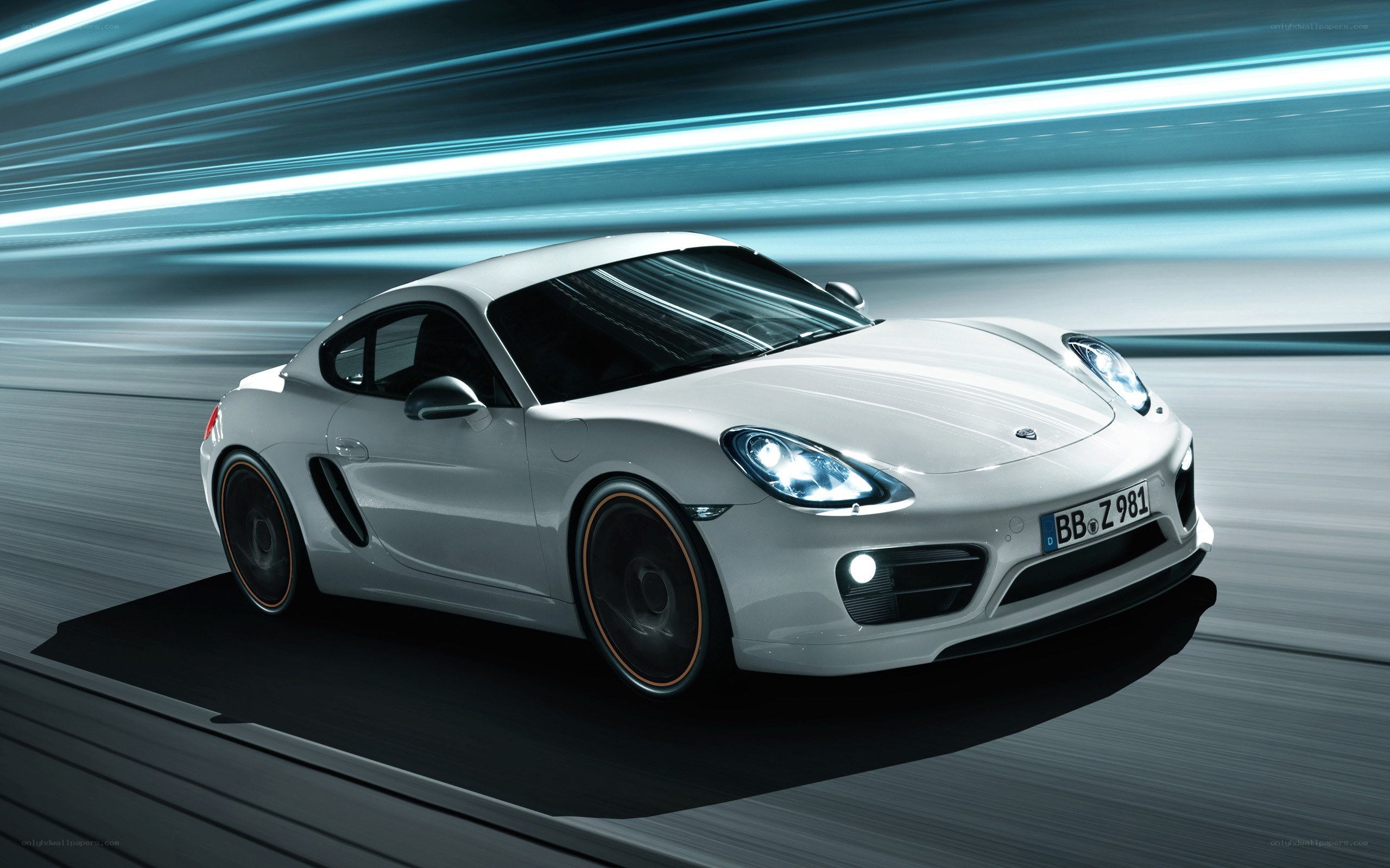 White Porsche Cayman in motion