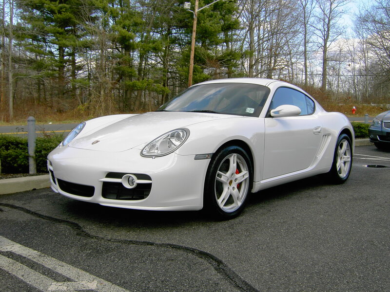 White Porsche Cayman parked