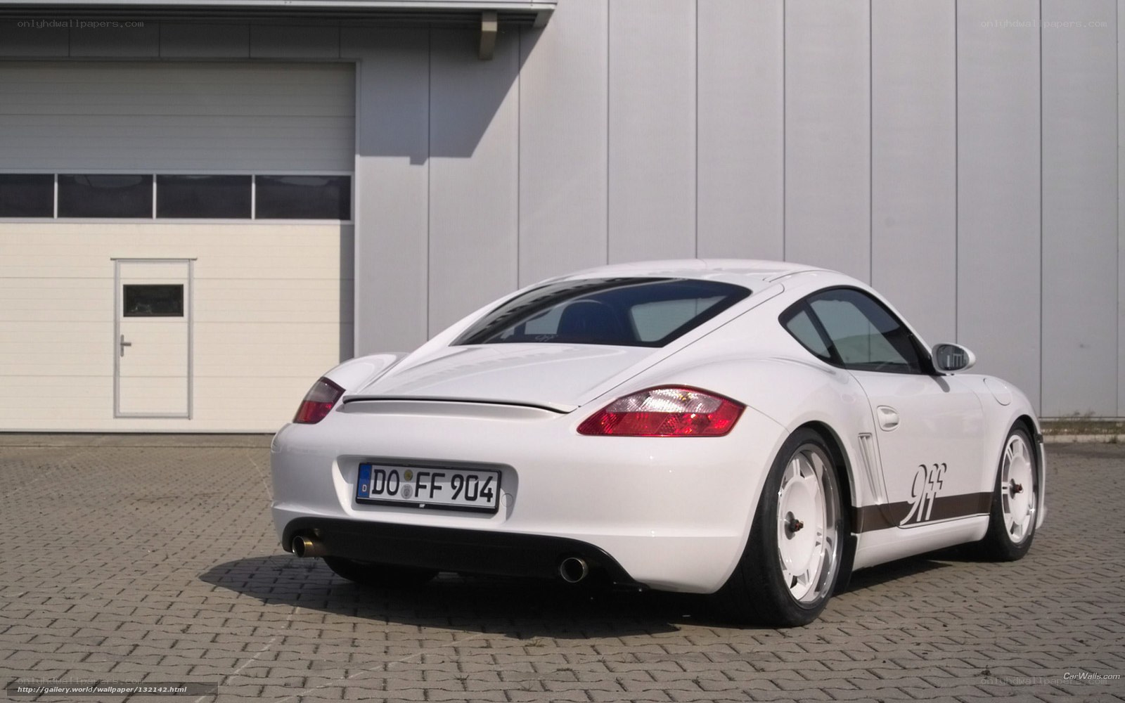 white porsche cayman sports car