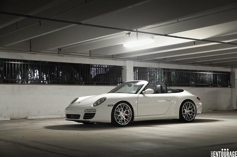 White Porsche convertible in garage