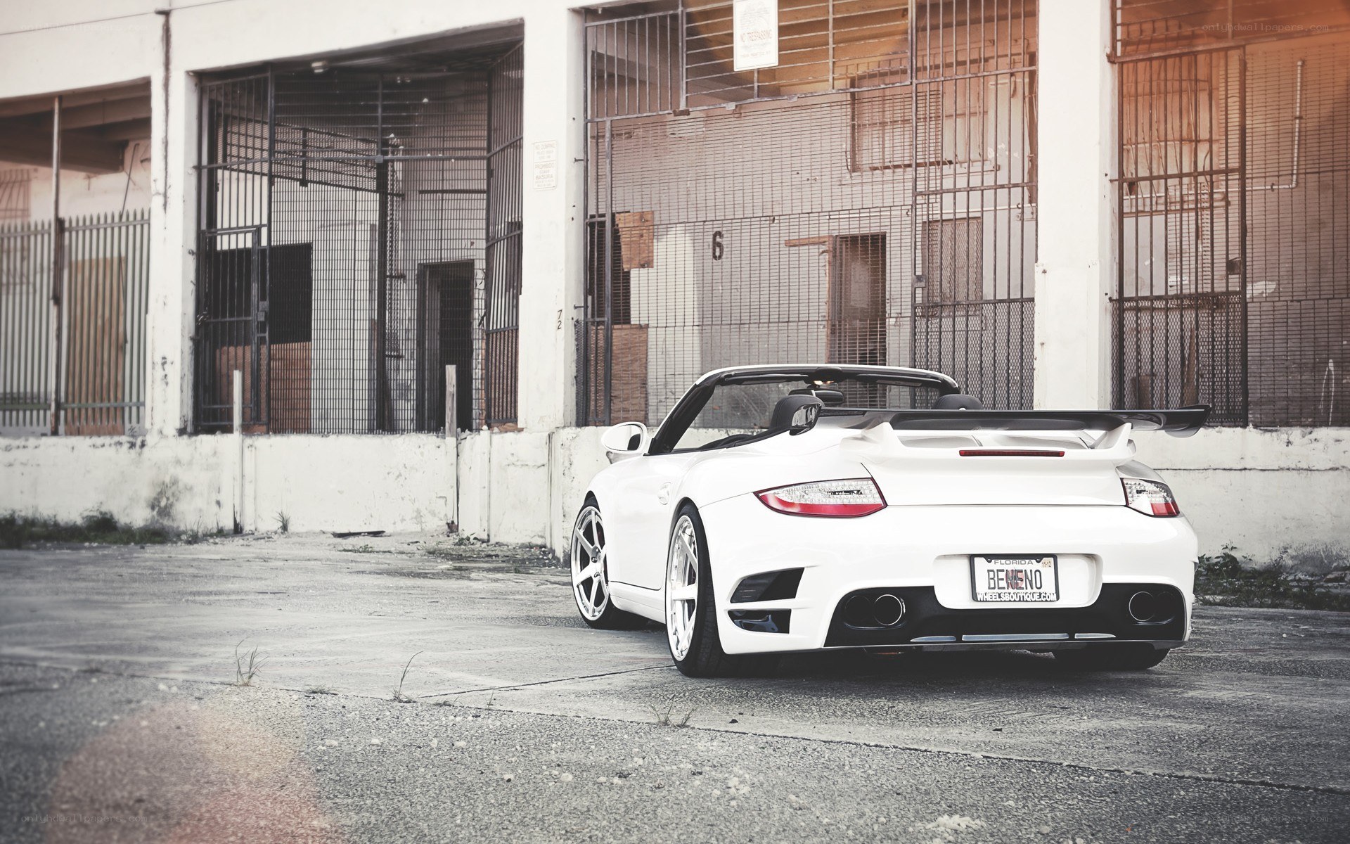 white porsche convertible parked
