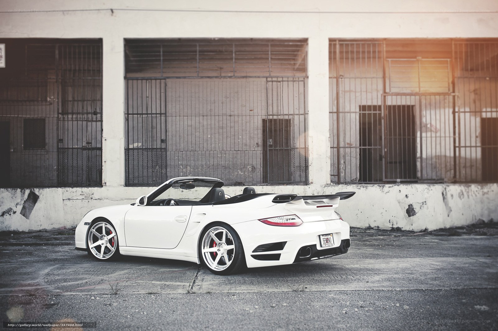 white porsche convertible parked