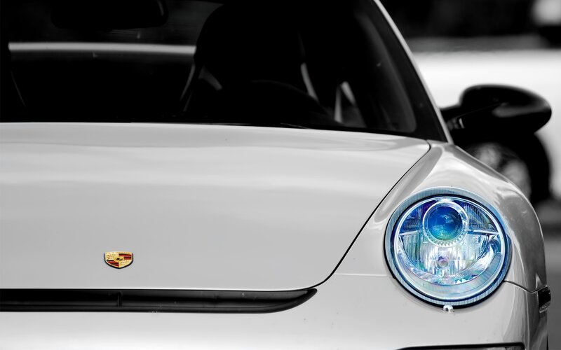white porsche front view