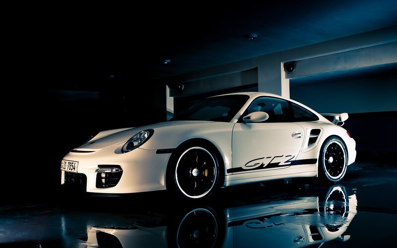 White Porsche GT2 in garage