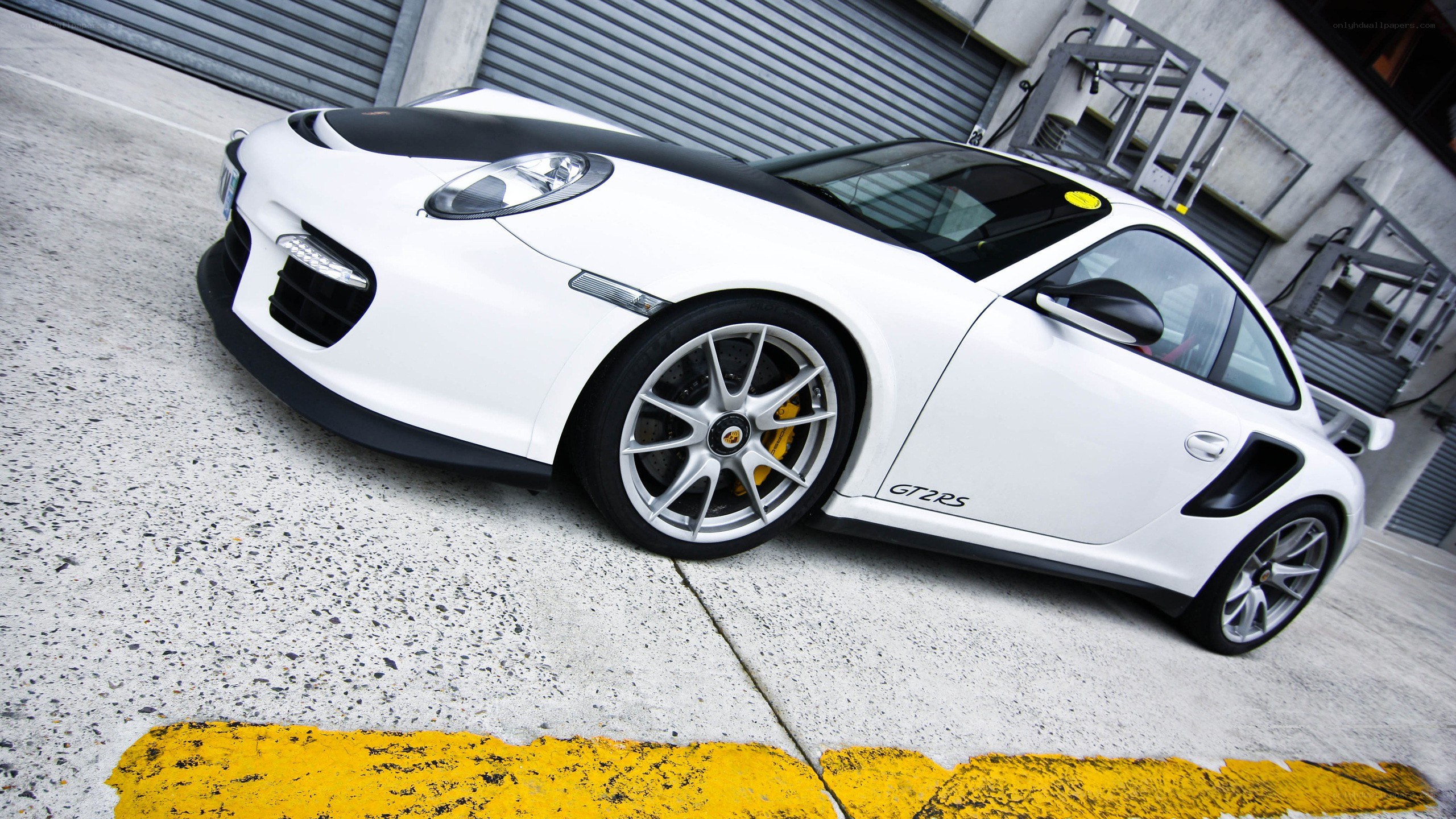 White Porsche GT2 RS parked