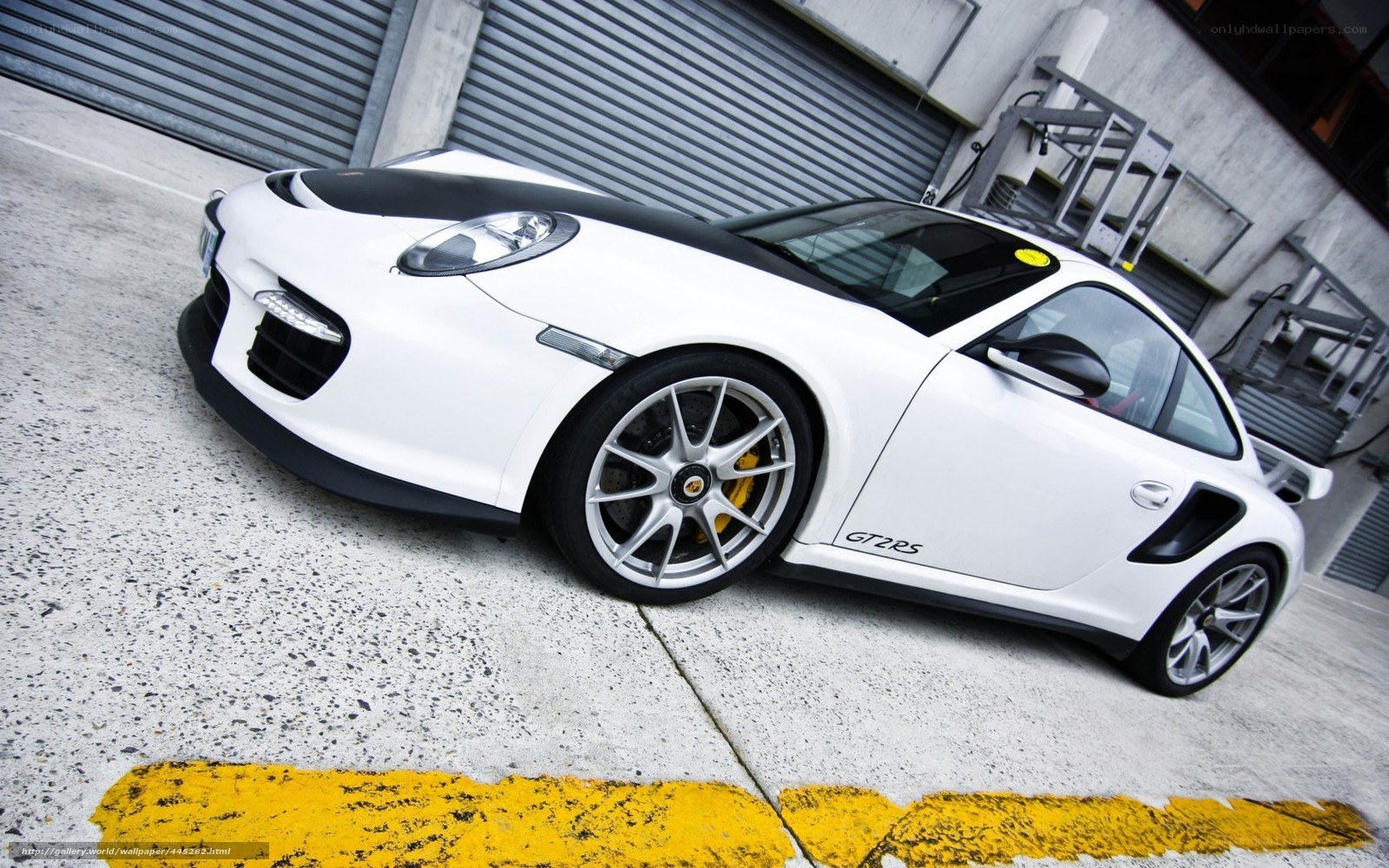White Porsche GT2 RS parked
