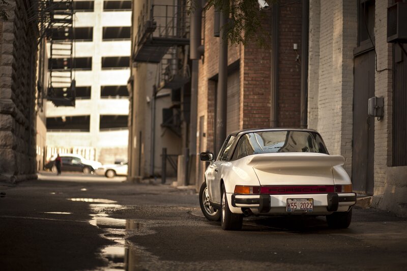 White Porsche in an alley