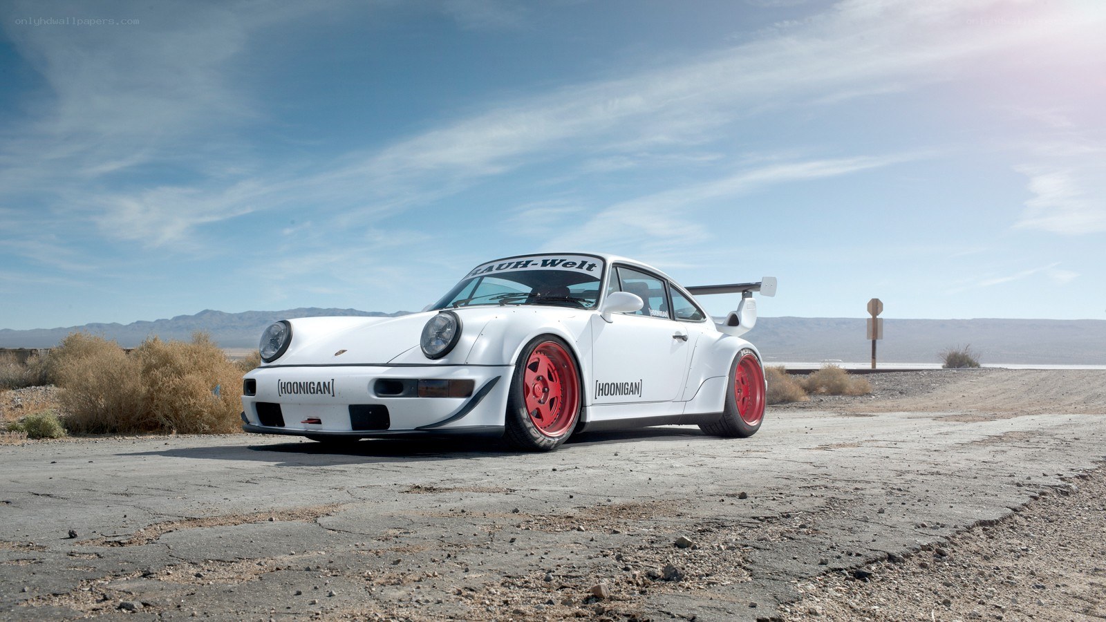 White Porsche in desert