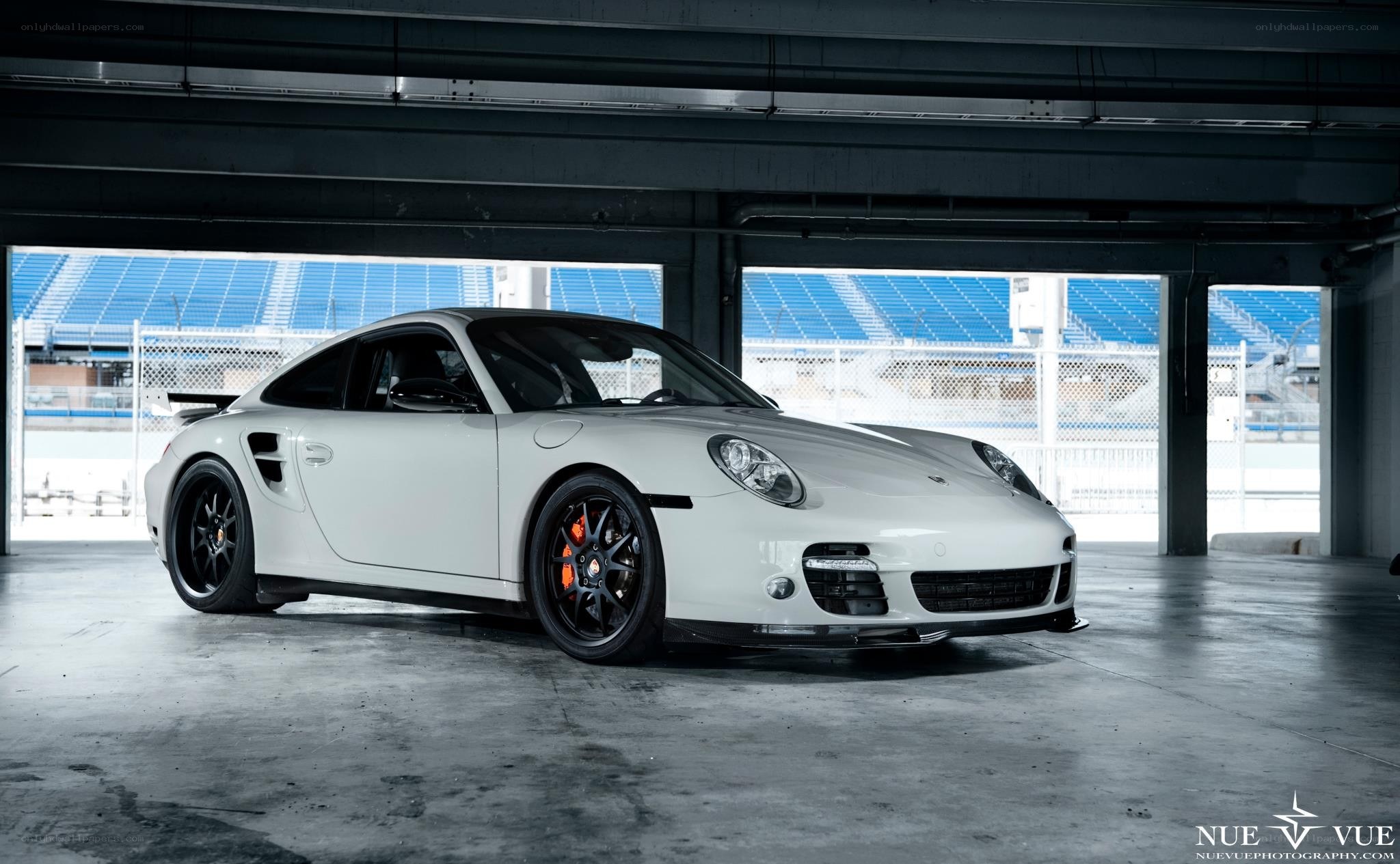 white porsche in garage